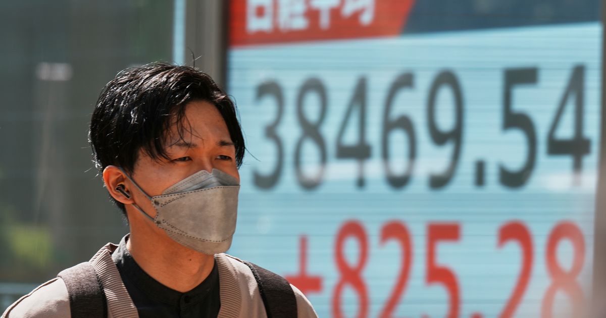 Asian shares gain after Wall Street’s rally, but hopes are tempered by trade war uncertainties