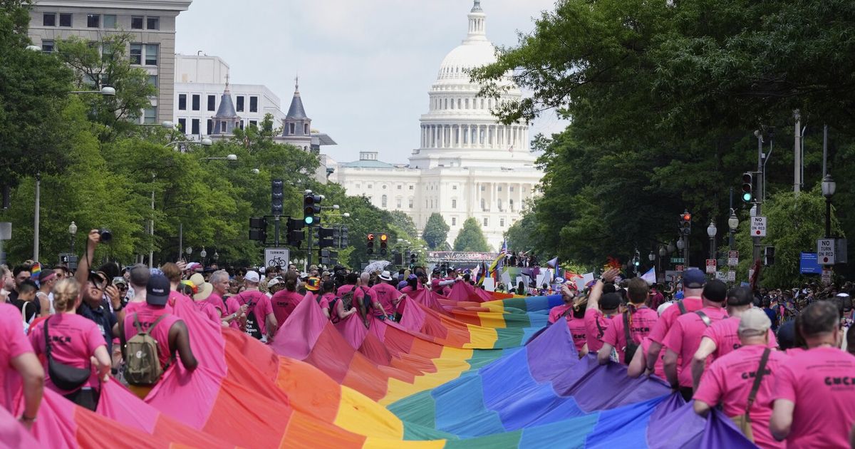 Cloudy skies can’t dim joy as thousands fill nation’s capital for World Pride parade