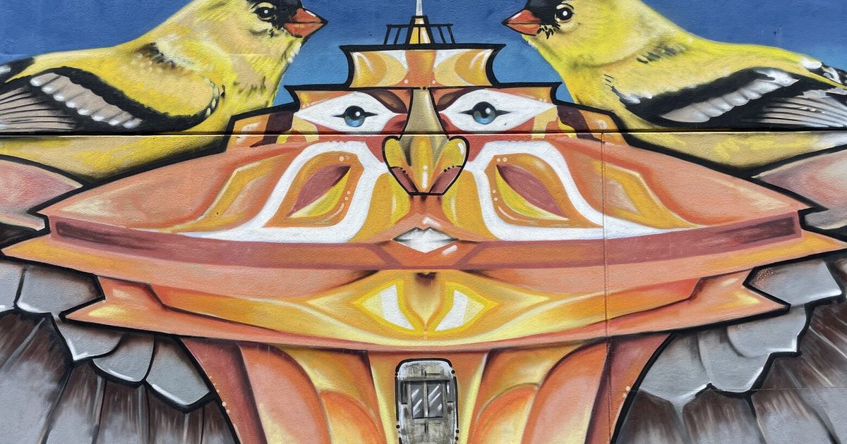 This neighborhood has the perfect mural walk to do during the summer
