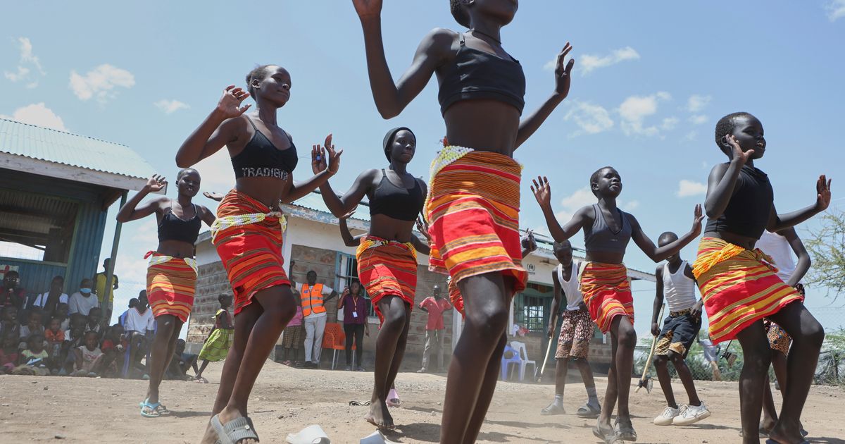 Fusion between culture and modernity as children dance in Kenya’s refugee camp