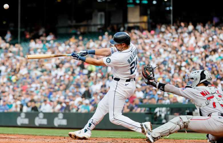 Seattle Mariners catcher Cal Raleigh launches a grand slam during the second inning Tuesday, June 17, 2025 in Seattle. (Jennifer Buchanan / The Seattle Times)