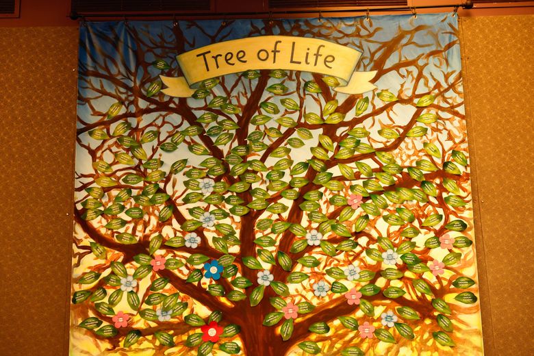 The Tree of Life displays names of Valley Communications Center call receivers and dispatchers who helped cardiac arrest patients or babies born during a call before first responders could get to the scene. (Karen Ducey / The Seattle Times)