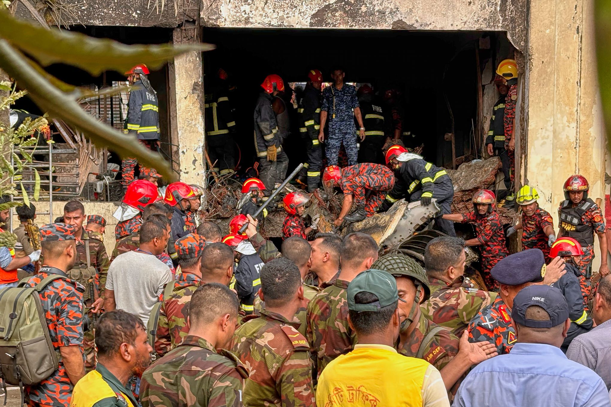 A Bangladesh Air Force jet crashes into a Dhaka school and kills 18 | The Seattle Times