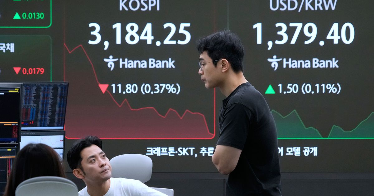 Asian shares are mixed after Wall Street sets more records for US stocks