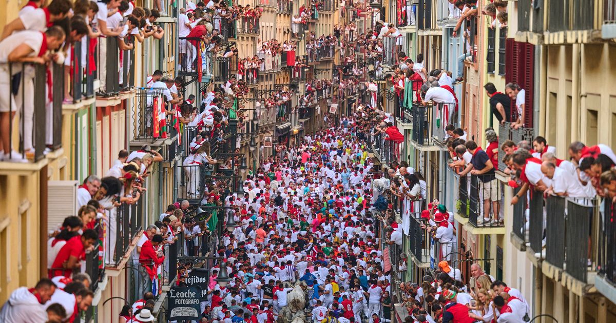 Top photos of thrilling moments and close calls at Spain’s San Fermín bull-running festival