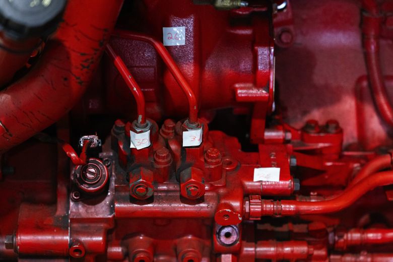 A donated Cummins diesel truck engine has parts numbered for students to be tested on at South Seattle College. (Ken Lambert / The Seattle Times)