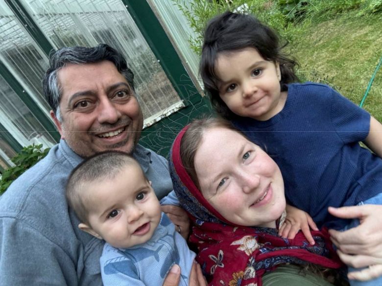 Muhammad Zahid Chaudhry, his wife Melissa, and their children, 2-year-old Salma and 8-month-old Adil, are shown in June. (Courtesy of the Chaudhry family)