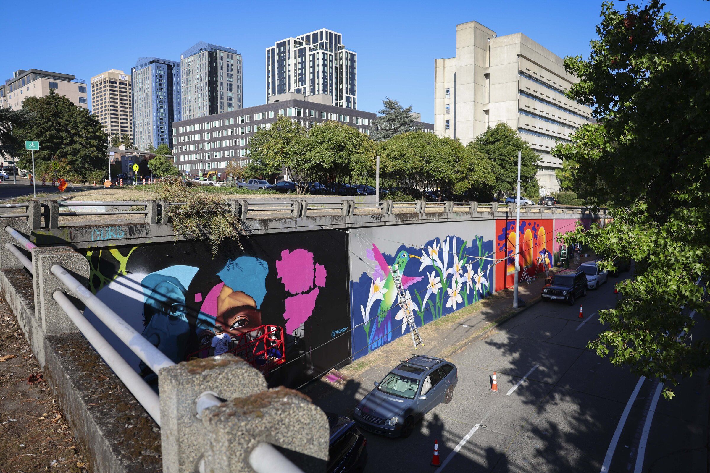 Ten artists paint Seattle murals representing migration and
