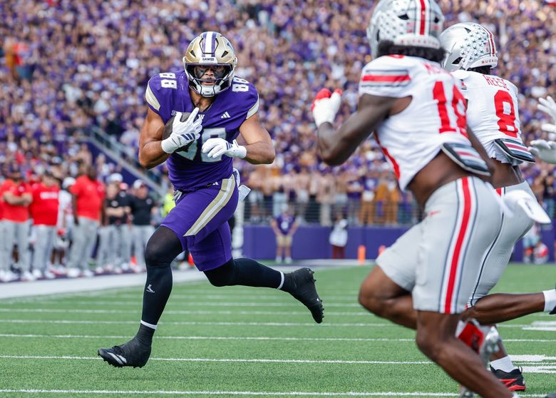 Washington tight end Quentin Moore rumbles to the Ohio State two-yard line, Sept. 27, 2025 at Husky Stadium in Seattle. (Dean Rutz / The Seattle Times)