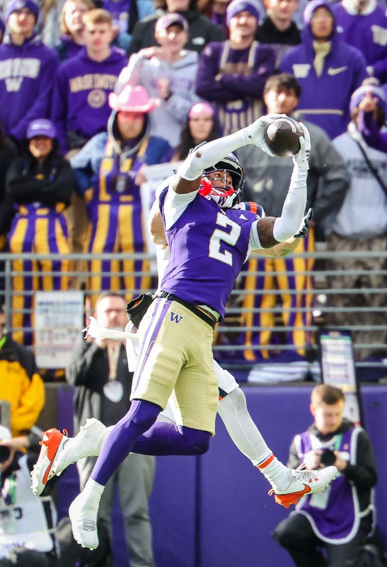 Washington safety Rahshawn Clark picks off a pass from Illinois quarterback Luke Altmyer in the fourth quarter Saturday, October 25, 2025 at Husky Stadium in Seattle. (Dean Rutz / The Seattle Times)