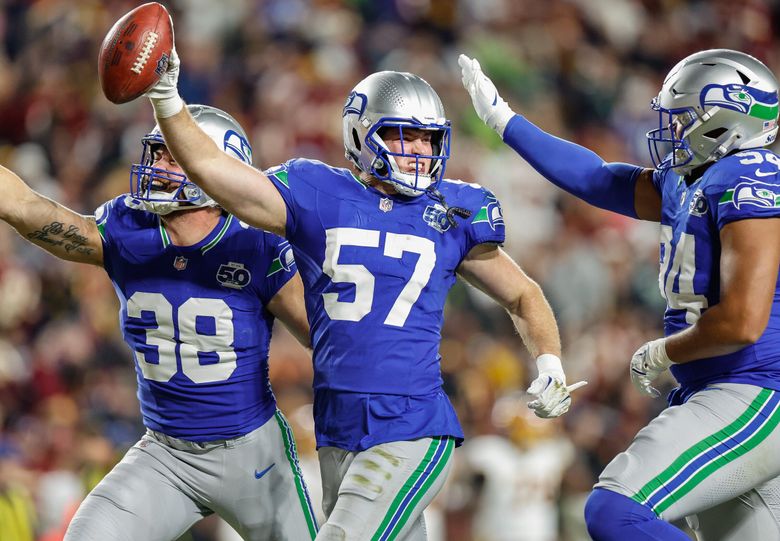 Connor O’Toole celebrates his fumble recovery in the second quarter. The Seattle Seahawks played the Washington Commanders in NFL Football Sunday, Nov. 2, 2025, at Northwest Stadium, in Landover, MD. (Dean Rutz / The Seattle Times)