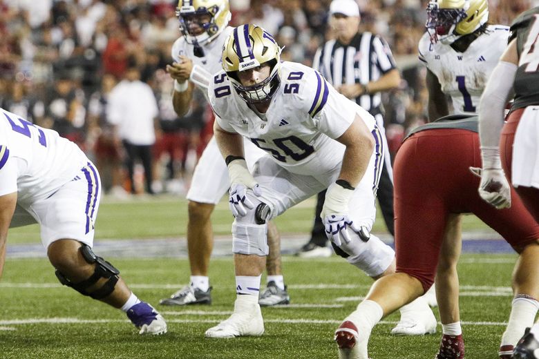 Washington offensive lineman Carver Willis lines up for a play against Washington State, Sept. 20, 2025 in Pullman. (Young Kwak / The Associated Press)