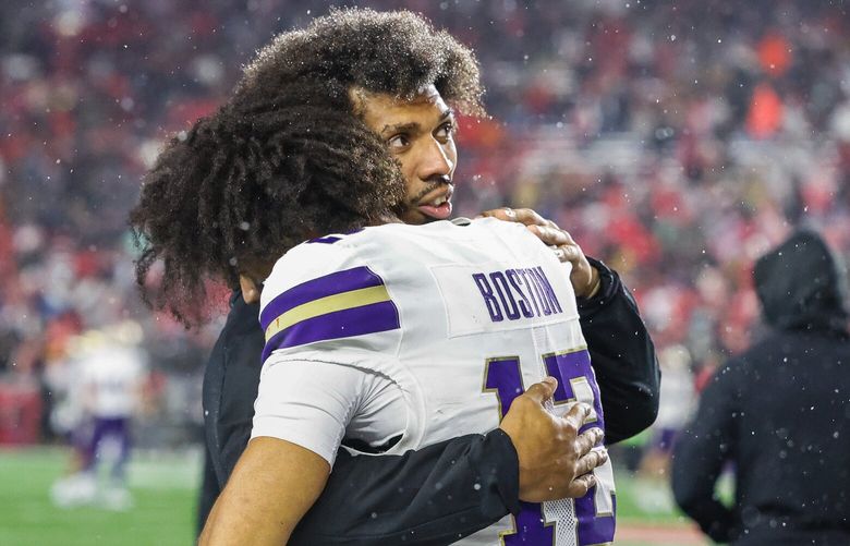 Denzel Boston is consoled as time runs out on Washington which was upset by Wisconsin 13-10. The 23rd-ranked Washington Huskies played the Wisconsin Badgers in Big-Ten football Saturday, Nov. 8, 2025 at Camp Randall Stadium, In Madison, WI. 231573