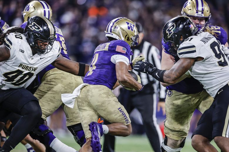 Purdue misses its defensive assignments and allows Washington’s Jordan Washington to slip past defenders and rush for a 68-yard touchdown in the second quarter. The Purdue Boilermakers played the Washington Huskies in Big-Ten Football Saturday, Nov. 15, 2025 at Husky Stadium, in Seattle, WA. (Dean Rutz / The Seattle Times)