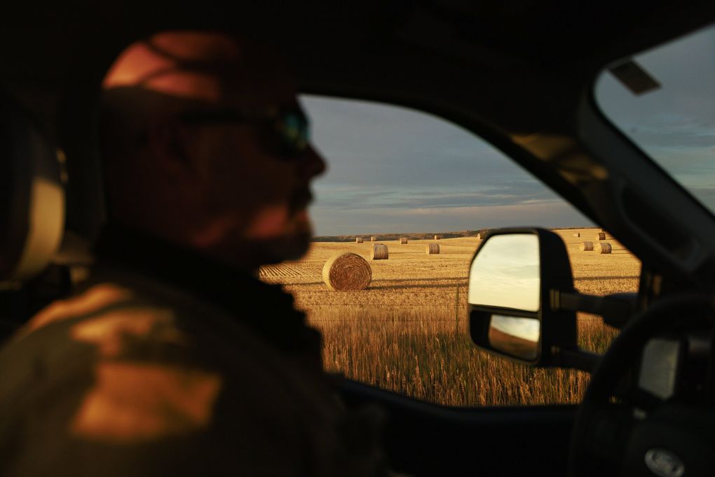 Plant manager Christopher Flowers drives to work at the Beaver Creek Wind Farm in Stillwater County, Montana. (Erika Schultz / The Seattle Times)