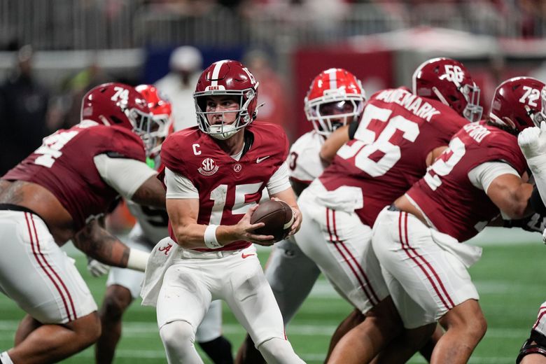 Alabama quarterback Ty Simpson (15) works against against Georgia during the first half of a Southeastern Conference championship NCAA college football game, Saturday, Dec. 6, 2025, in Atlanta. (AP Photo/Mike Stewart) GAMS1 GAMS1 (Mike Stewart / The Associated Press)