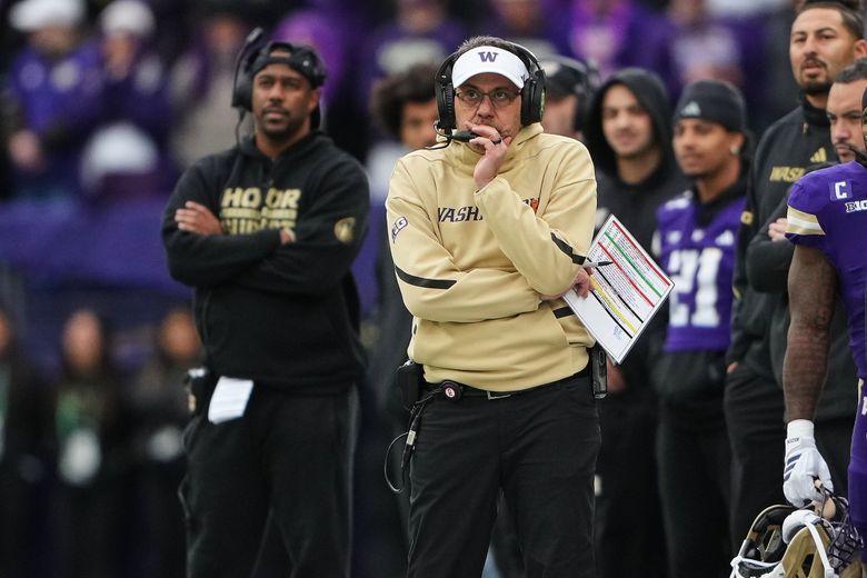 Washington head coach Jedd Fisch watches from the sideline during the first half of an NCAA college football game against Oregon, Saturday, Nov. 29, 2025, in Seattle. (Lindsey Wasson / The Associated Press)