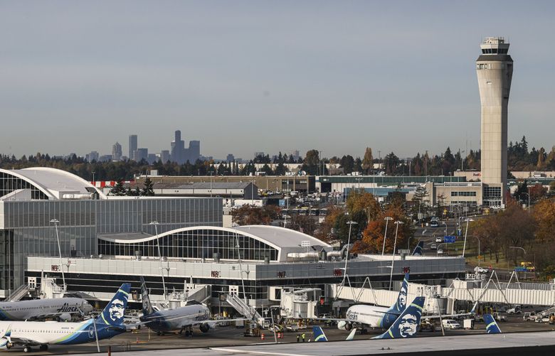Daily operations at Seattle-Tacoma International Airport on Oct. 30. (Kevin Clark / The Seattle Times)