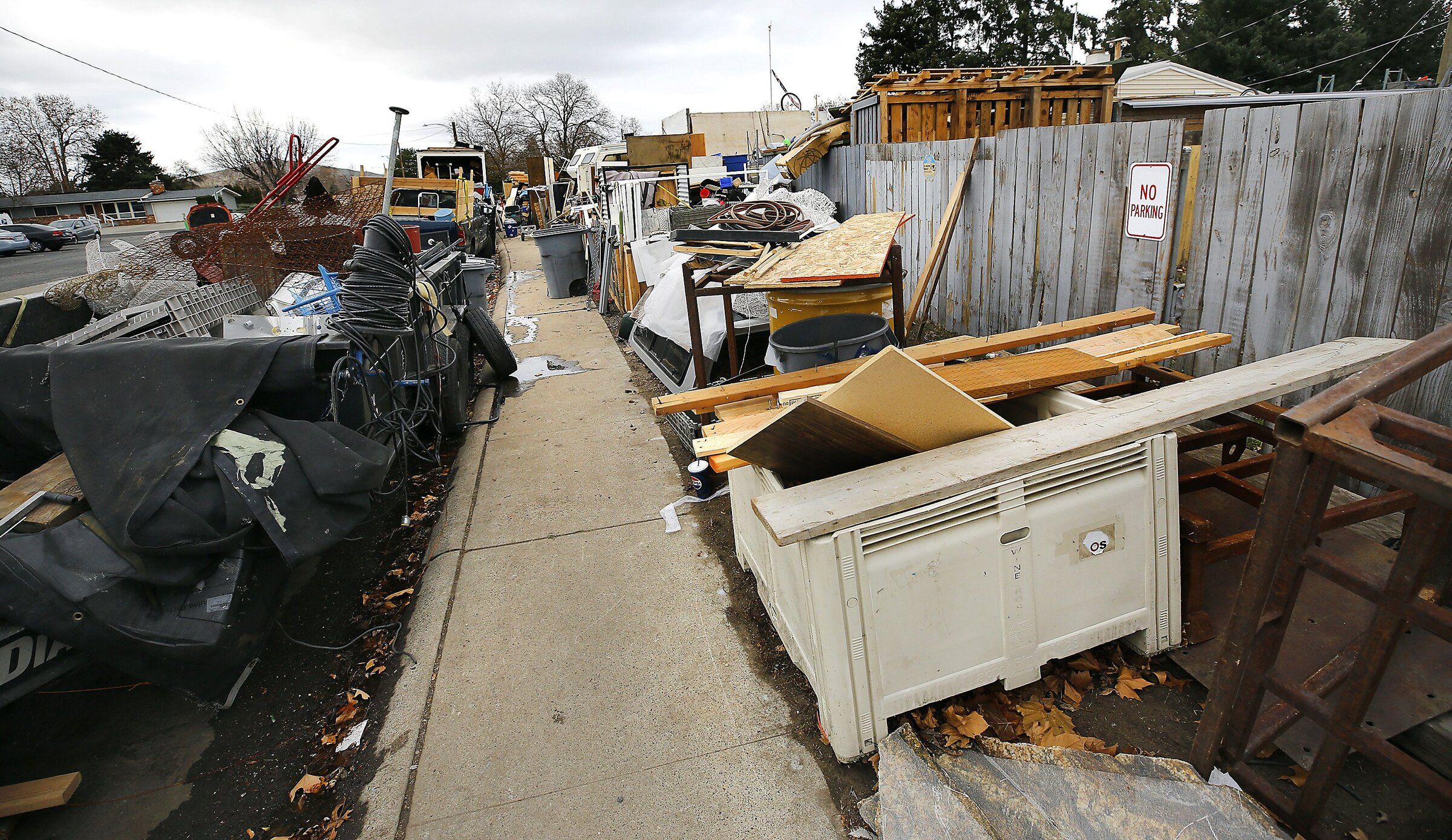 Richland calls home 'immediate' threat as mounds of junk engulf it