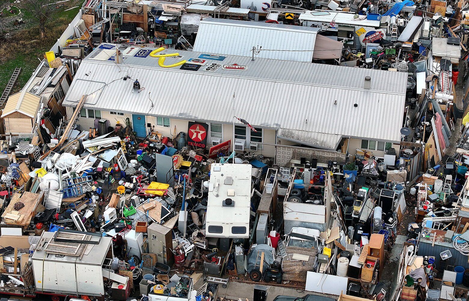 Richland calls home 'immediate' threat as mounds of junk engulf it