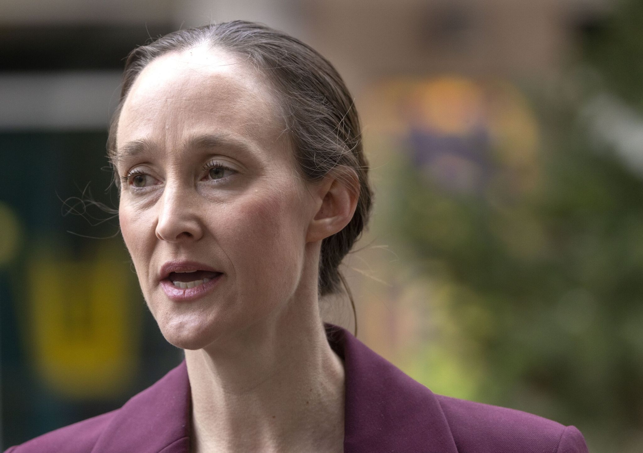 Kate Wilson speaks to reporters after a transition team meeting where she announced policies on shelters and transportation at El Centro de la Raza on Beacon Hill on Jan. 15. (Ellen M. Banner / The Seattle Times)
