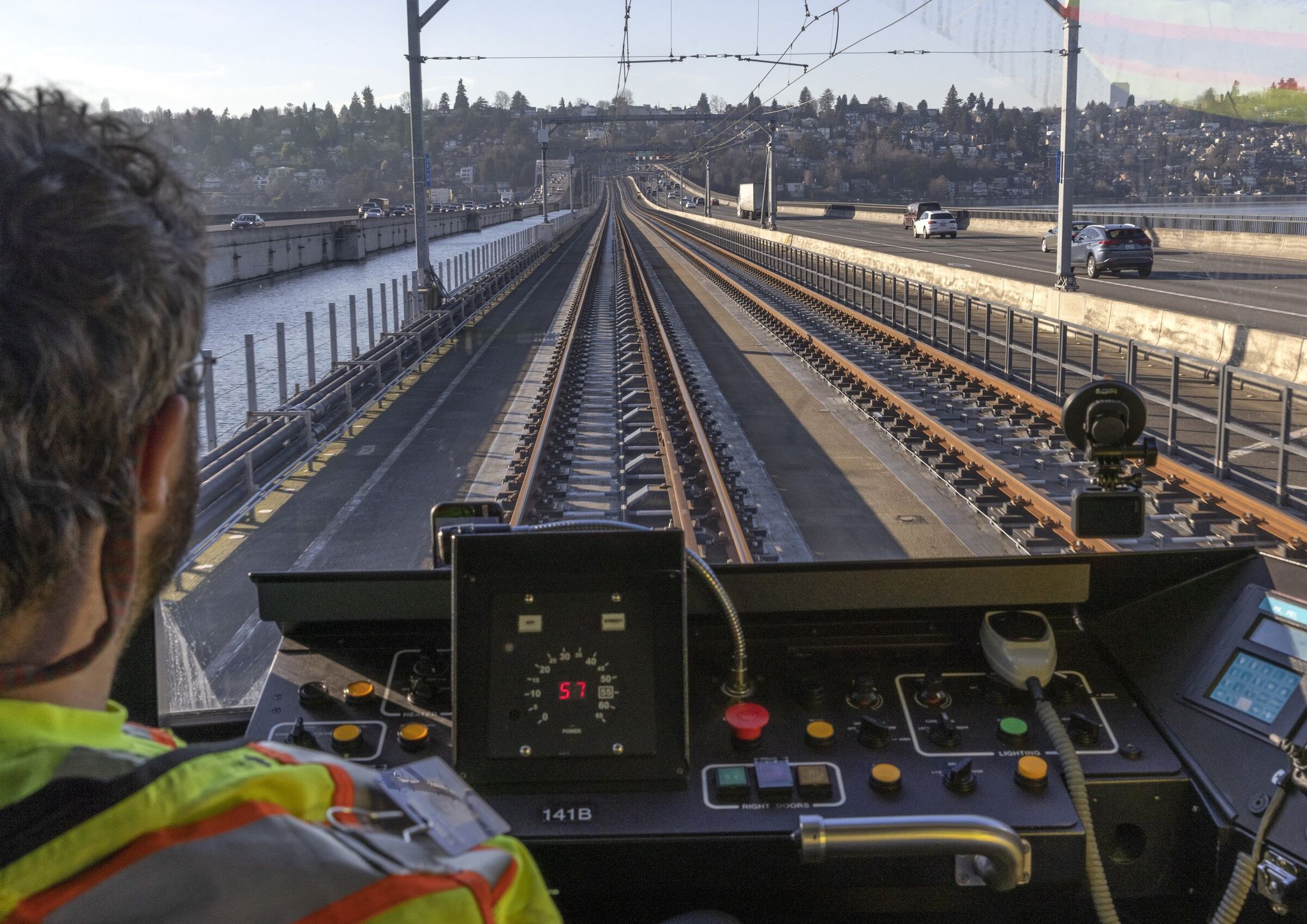 A light-rail train on a test run headed east on Wednesday across Lake Washington on the I-90 bridge. (Ellen M. Banner / The Seattle Times)