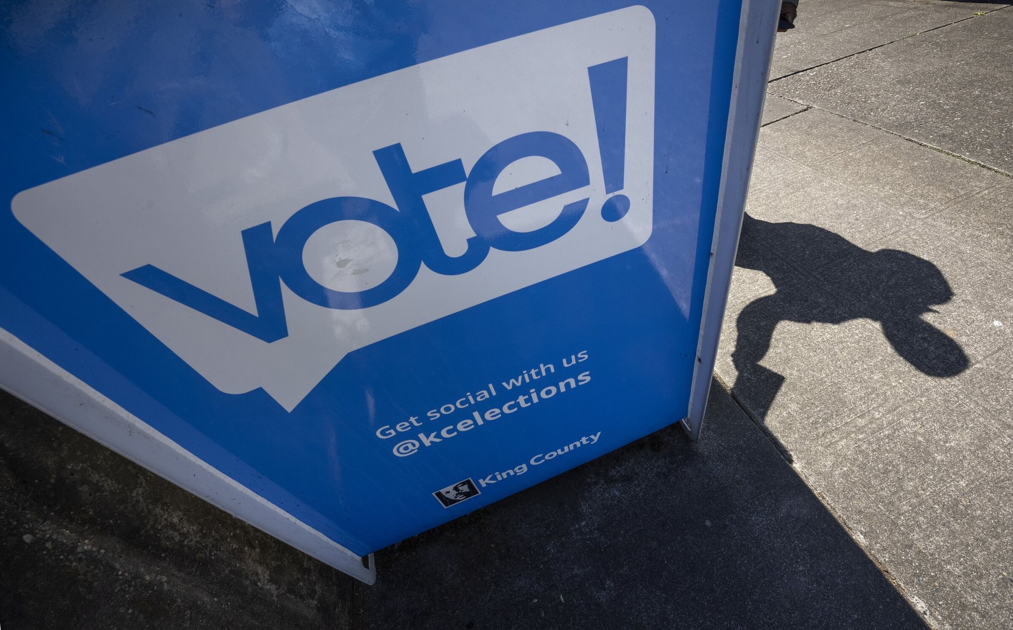 A voter drops a ballot into a ballot box at the Rainier Community Center in Seattle. House Bill 1196 would guarantee voting rights to everyone, removing that right only in the case of conviction for a capital offense punishable by death. Since the state officially abolished the death penalty in 2023, if the bill is signed, virtually everyone incarcerated in Washington would be eligible to vote unless the state restores capital punishment. (Ellen M. Banner / The Seattle Times, 2025)