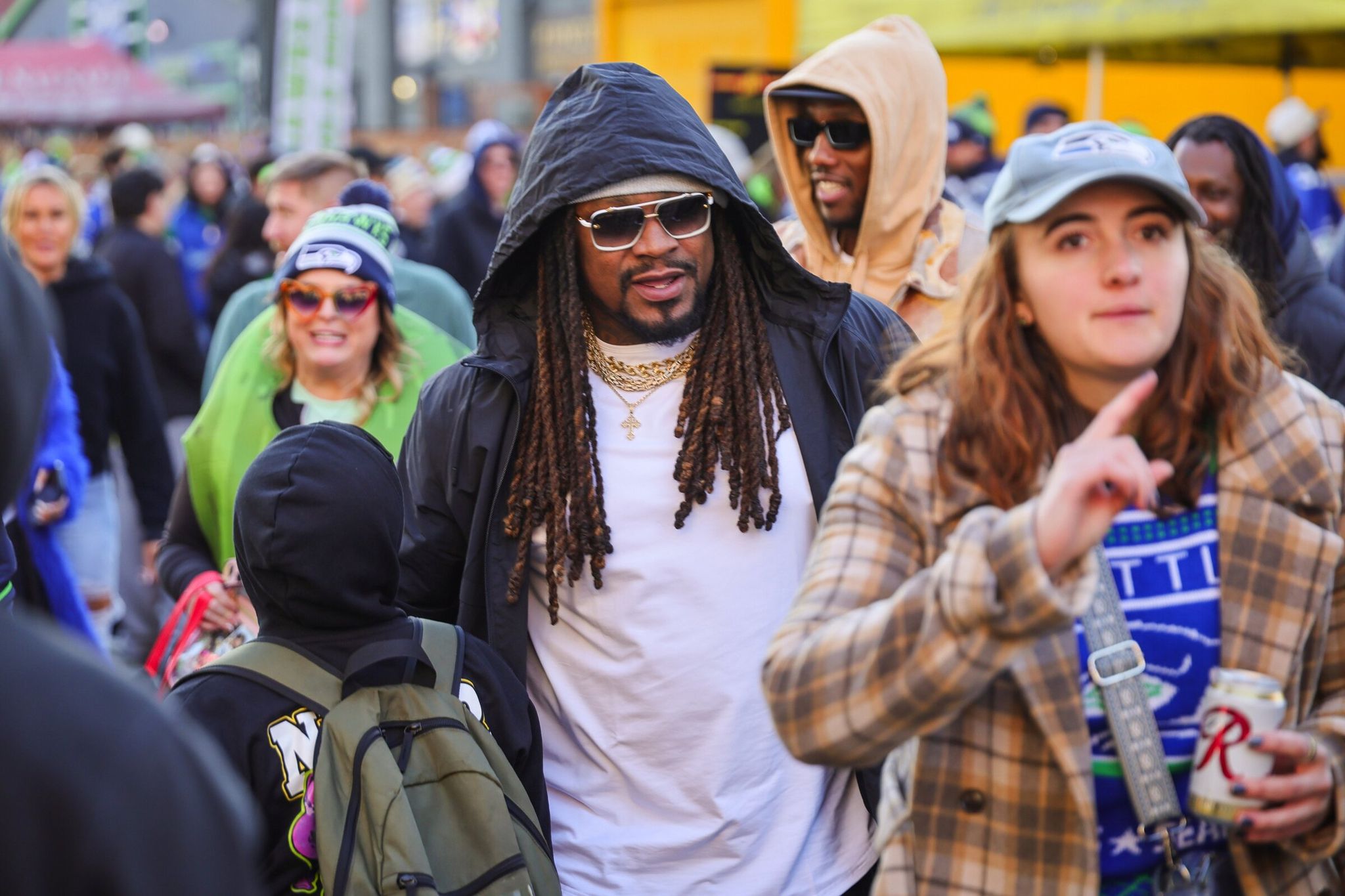 Marshawn Lynch greets fans outside Lumen Field before the NFC championship game against the Rams on Sunday afternoon in Seattle, Jan. 25, 2026. (Kevin Clark / The Seattle Times)