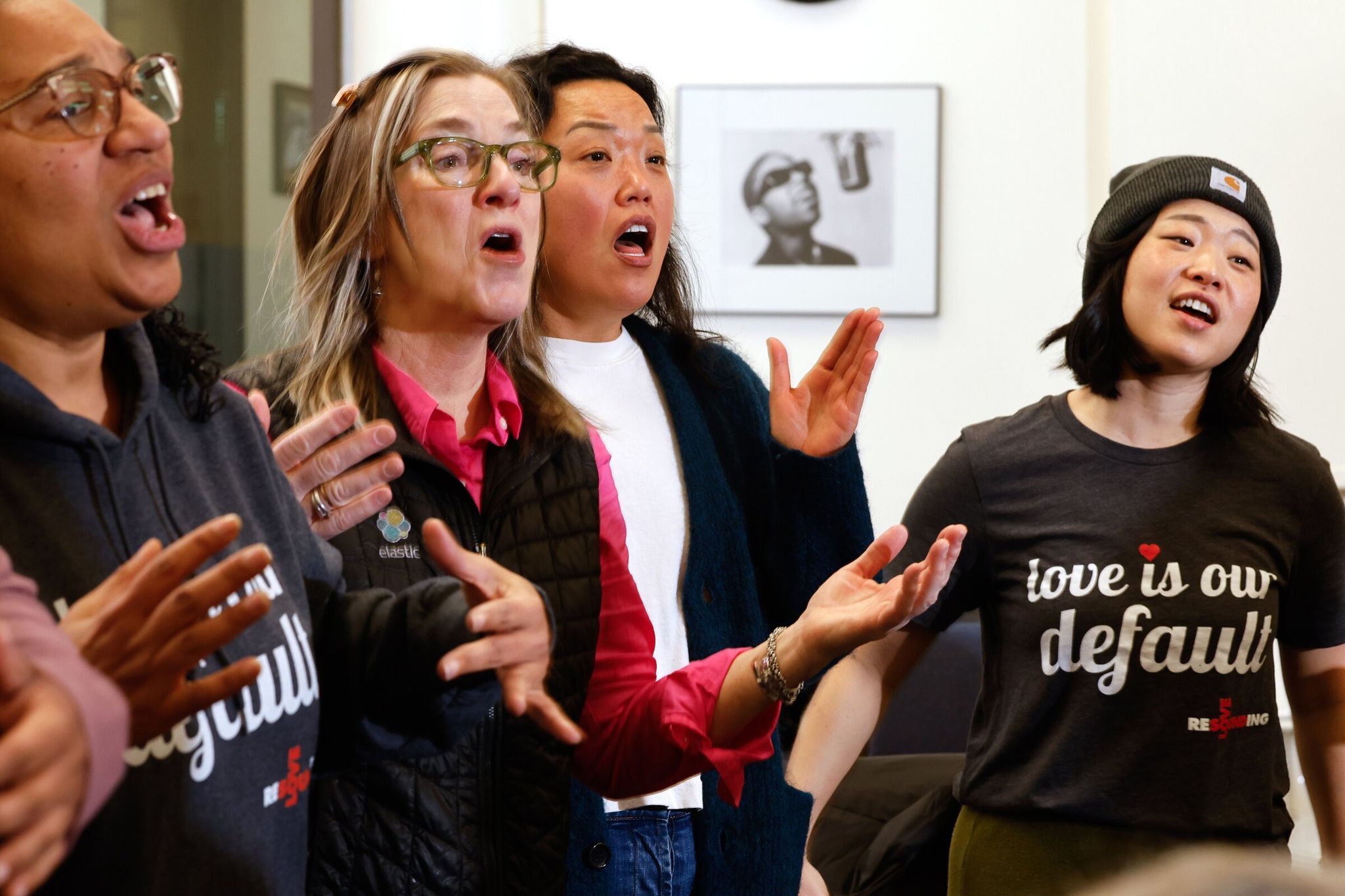 Members of the alto section of Resounding Love, including (left to right) Reverend Angela Farrar Small, Kim Becklund, Nikki Weston and on the right Veronica Moon, sing during rehearsal at South Seattle College on Saturday. (Karen Ducey / The Seattle Times)