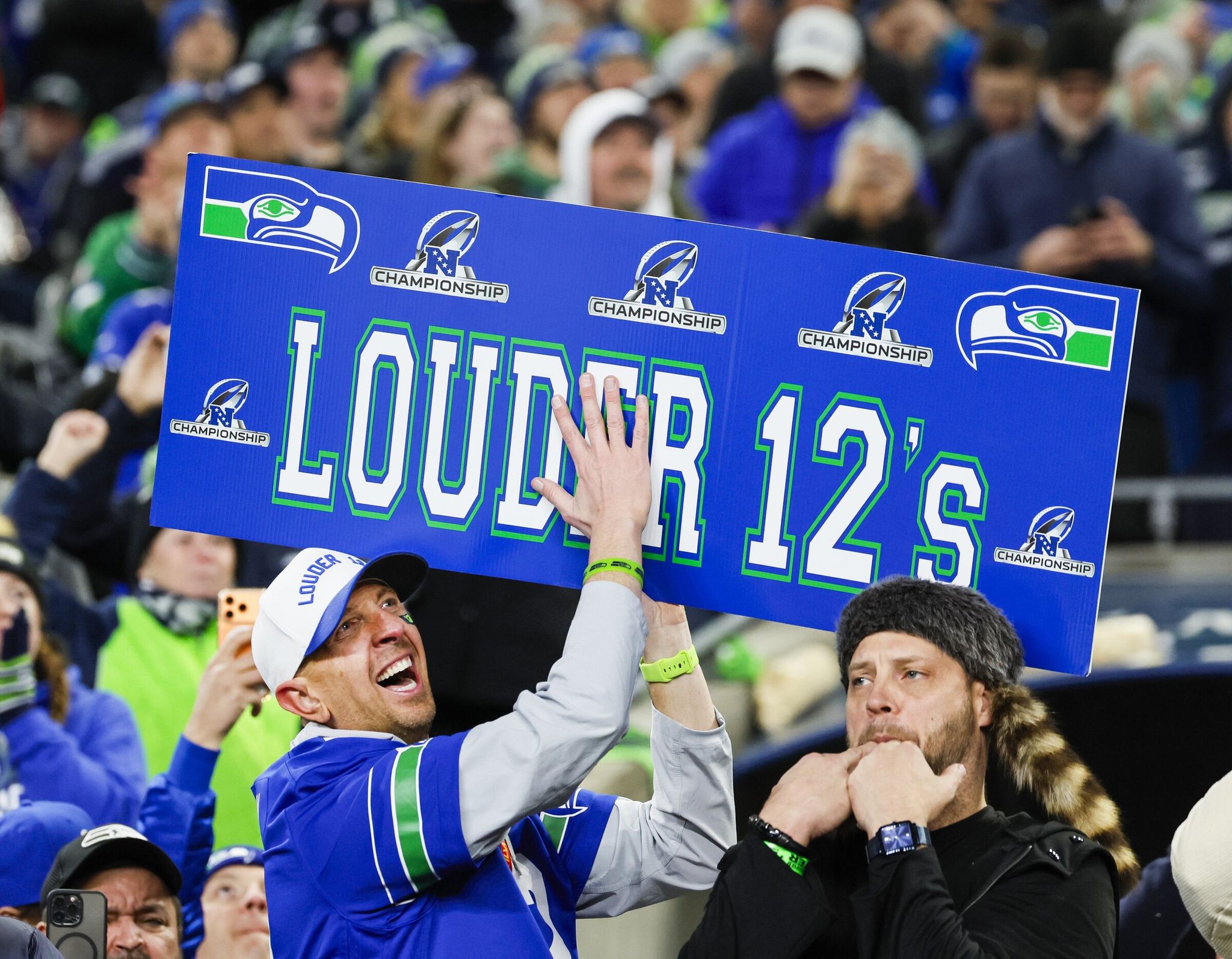 Seattle Seahawks fans cheering in the stands during the NFC championship game against the Los Angeles Rams at Lumen Field on Sunday, Jan. 25, 2026, in Seattle. (Jennifer Buchanan / The Seattle Times)