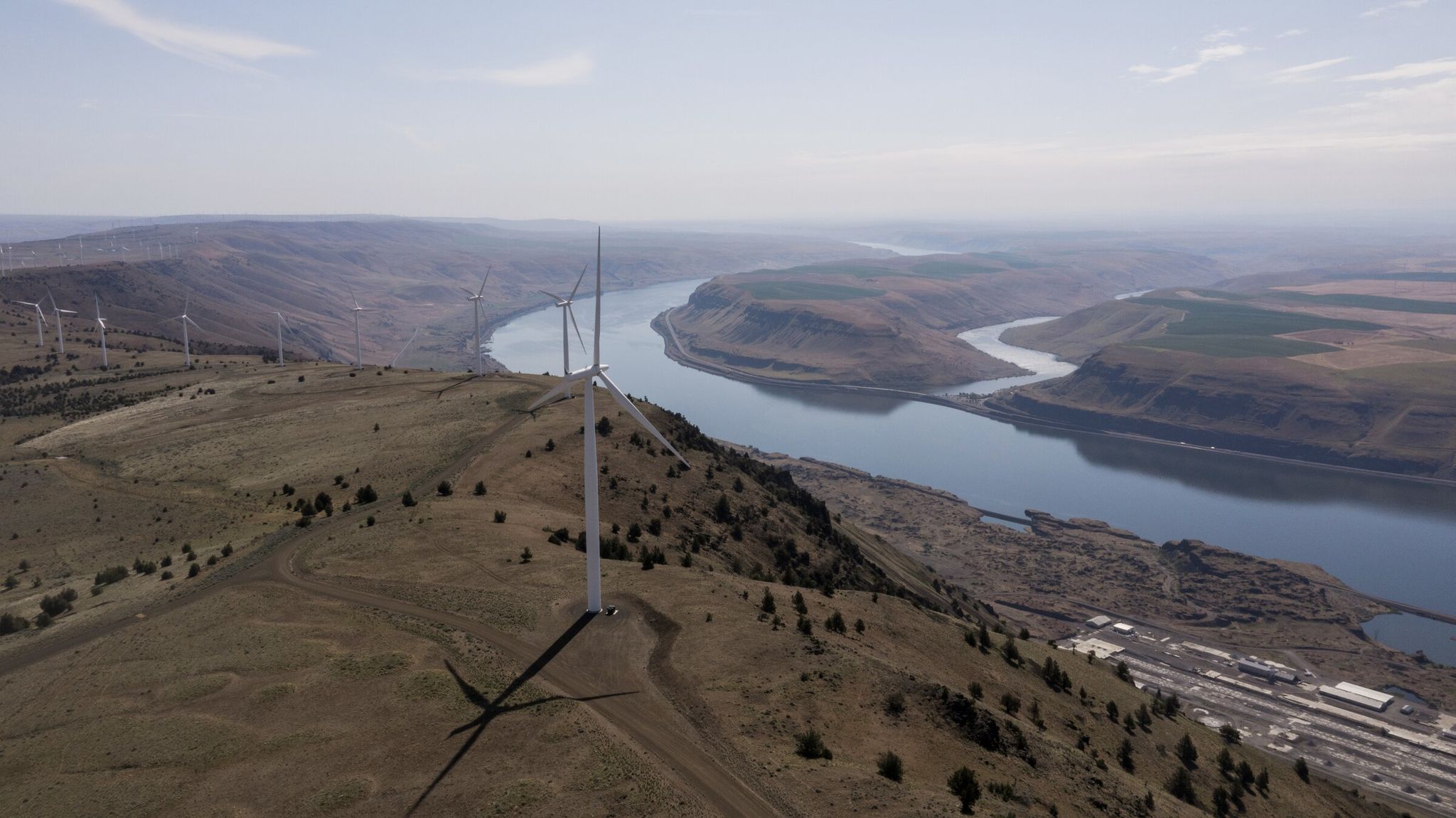 This drone photo taken at 2,000 feet above a closed aluminum plant on the Columbia River shows the landscape around the proposed site of the upper reservoir for the Goldendale energy storage project. (provided by Rye Development)
