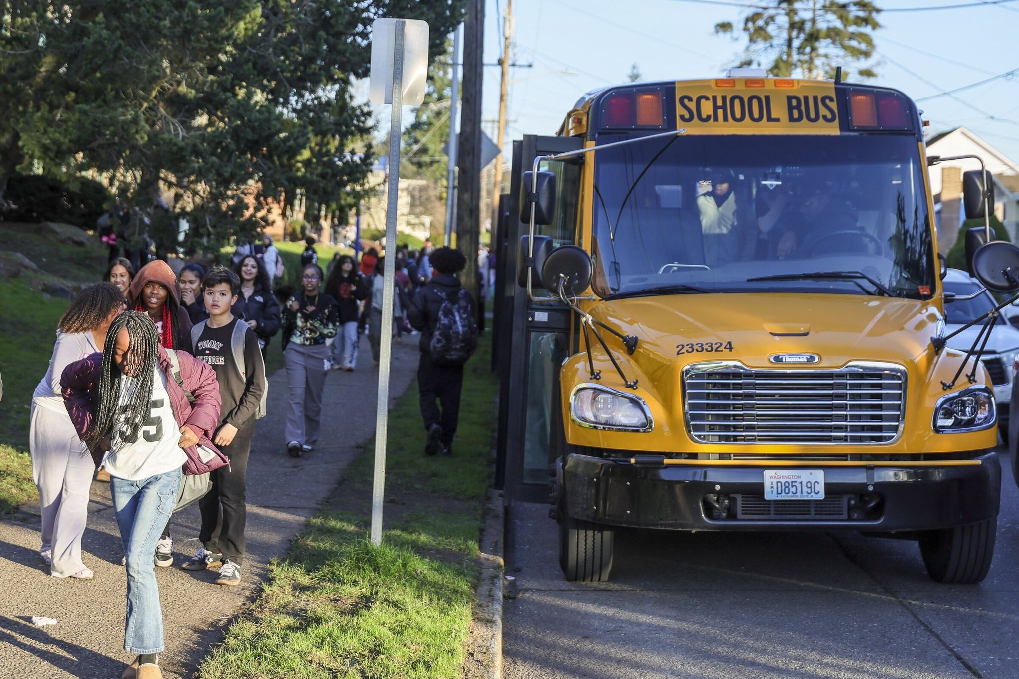 Aki Kurose Middle School students were released at the usual time on Tuesday, Jan. 20. Earlier that day the school went into shelter‑in‑place because of rumors of ICE activity in the area. (Kevin Clark / The Seattle Times)