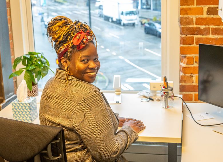 NOW: Valeriana C.B. Estes of the Social Justice Fund works in her office above Second Avenue. (Jean Sherrard)