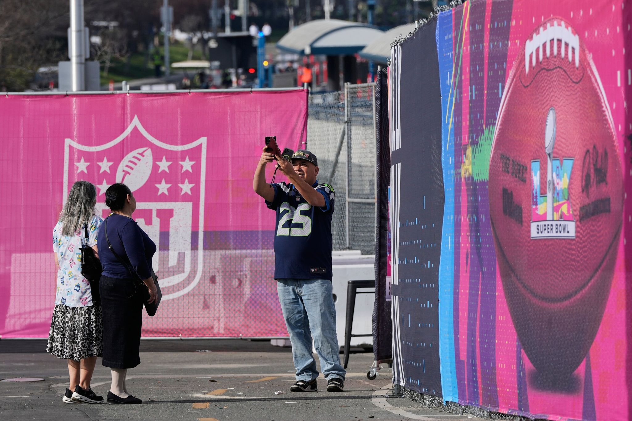People take photos at Levi's Stadium, where Super Bowl LX between the Seattle Seahawks and the New England Patriots will be held in Santa Clara, California. (Godofredo A. Vásquez / The Associated Press)