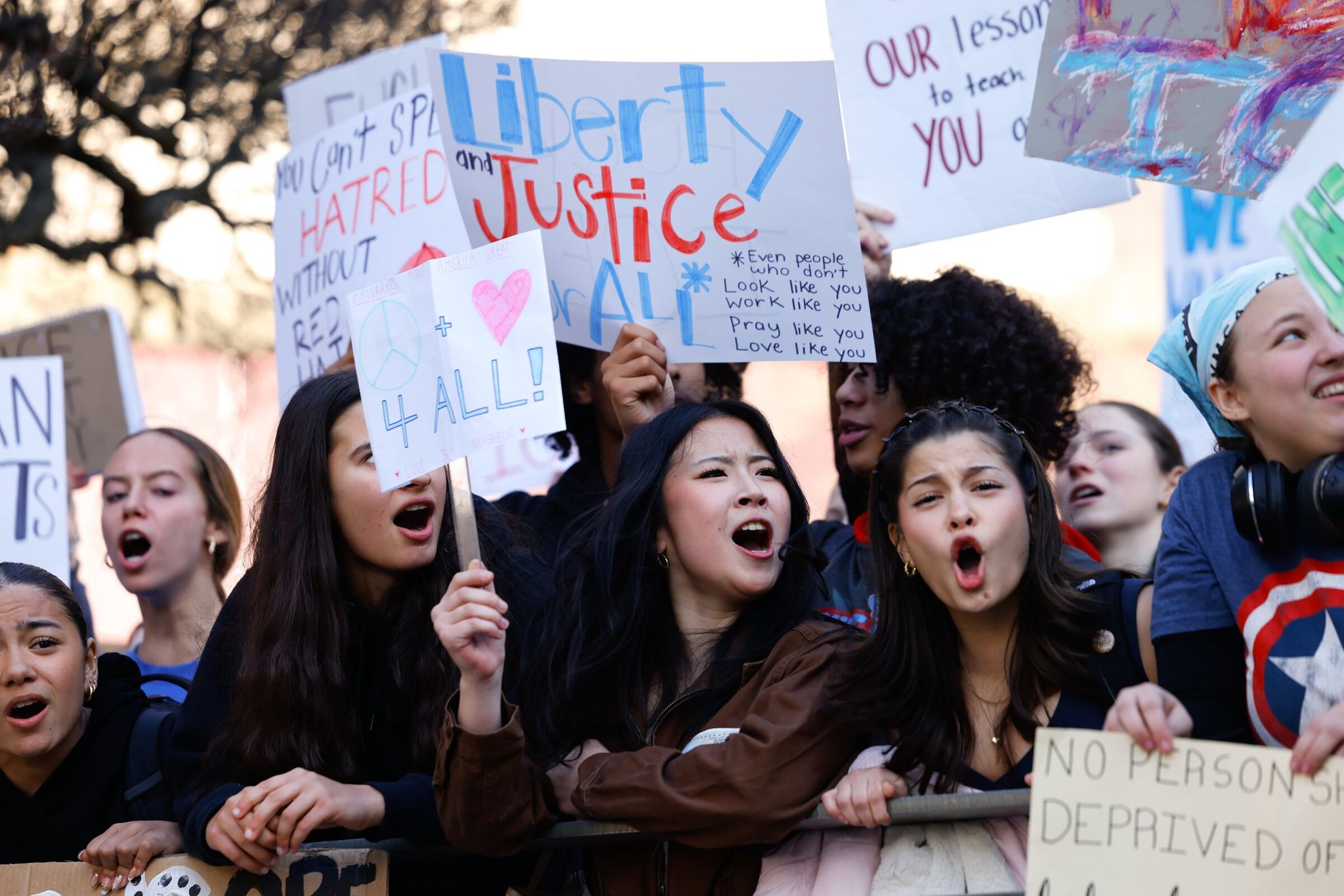 Seattle high school students protest the U.S. Immigration and Customs Enforcement (ICE) at City Hall on Thursday. Teenagers gathered to protest aggressive and sometimes violent immigration-enforcement tactics in Minneapolis and the fear those tactics have instilled in the families of their peers. (Karen Ducey / The Seattle Times)