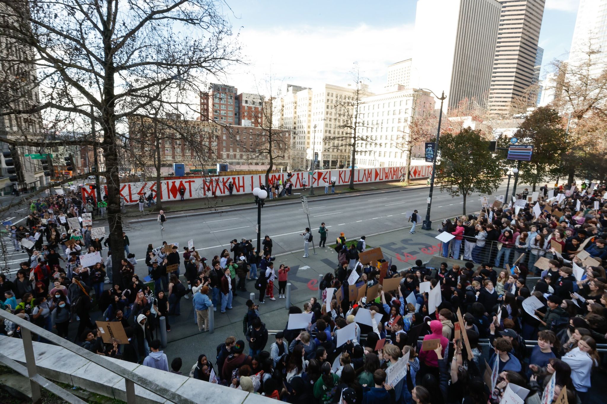 Hundreds of students from 17 Seattle high schools protest ICE at City Hall on Thursday. (Karen Ducey / The Seattle Times)
