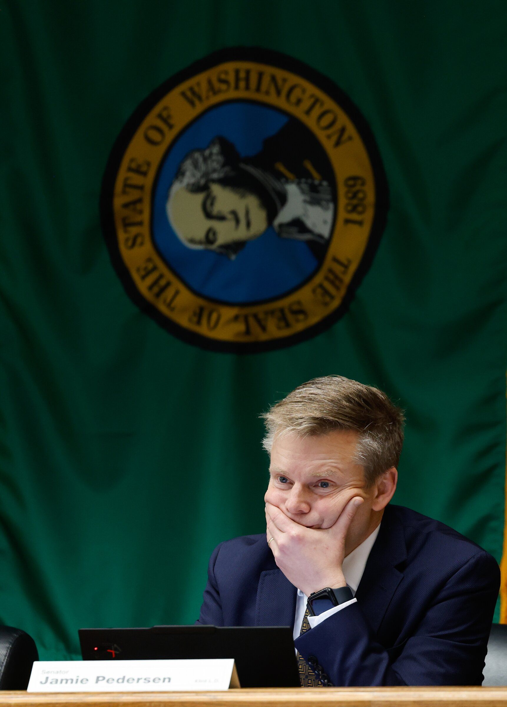 Senate Majority Leader Jamie Pedersen listens to testimony on the proposed millionaire income tax. Pedersen is the chief sponsor of the proposal. (Karen Ducey / The Seattle Times)