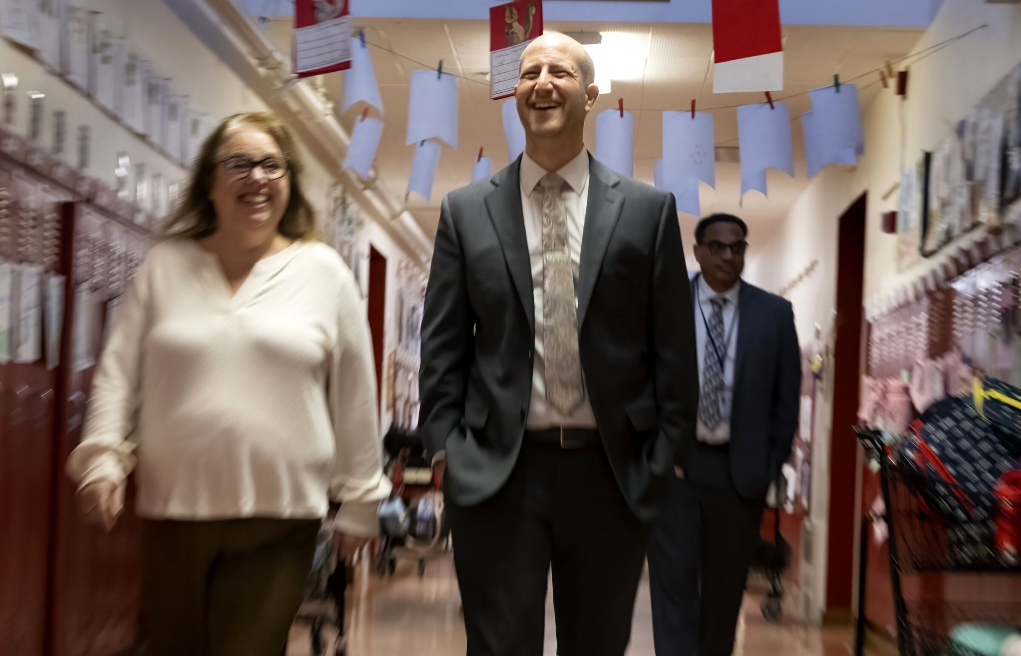 Cindy Chappu, principal of Lafayette Elementary, gives new Seattle Public Schools Superintendent Ben Schuldtner a tour of the West Seattle school on Wednesday. (Ellen M. Banner / The Seattle Times)