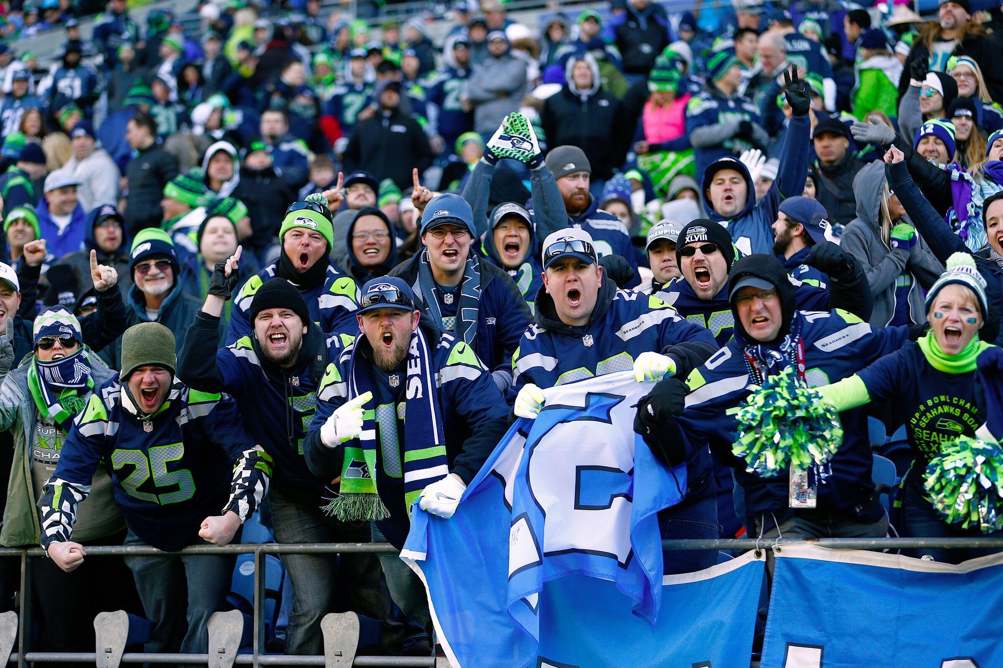 Fans gather inside the Seahawks’ stadium, then known as CenturyLink Field, awaiting the arrival of players and coaches during the Super Bowl XLVIII victory parade and fan rally on Feb. 5, 2014, in Seattle. (John Lok / The Seattle Times)