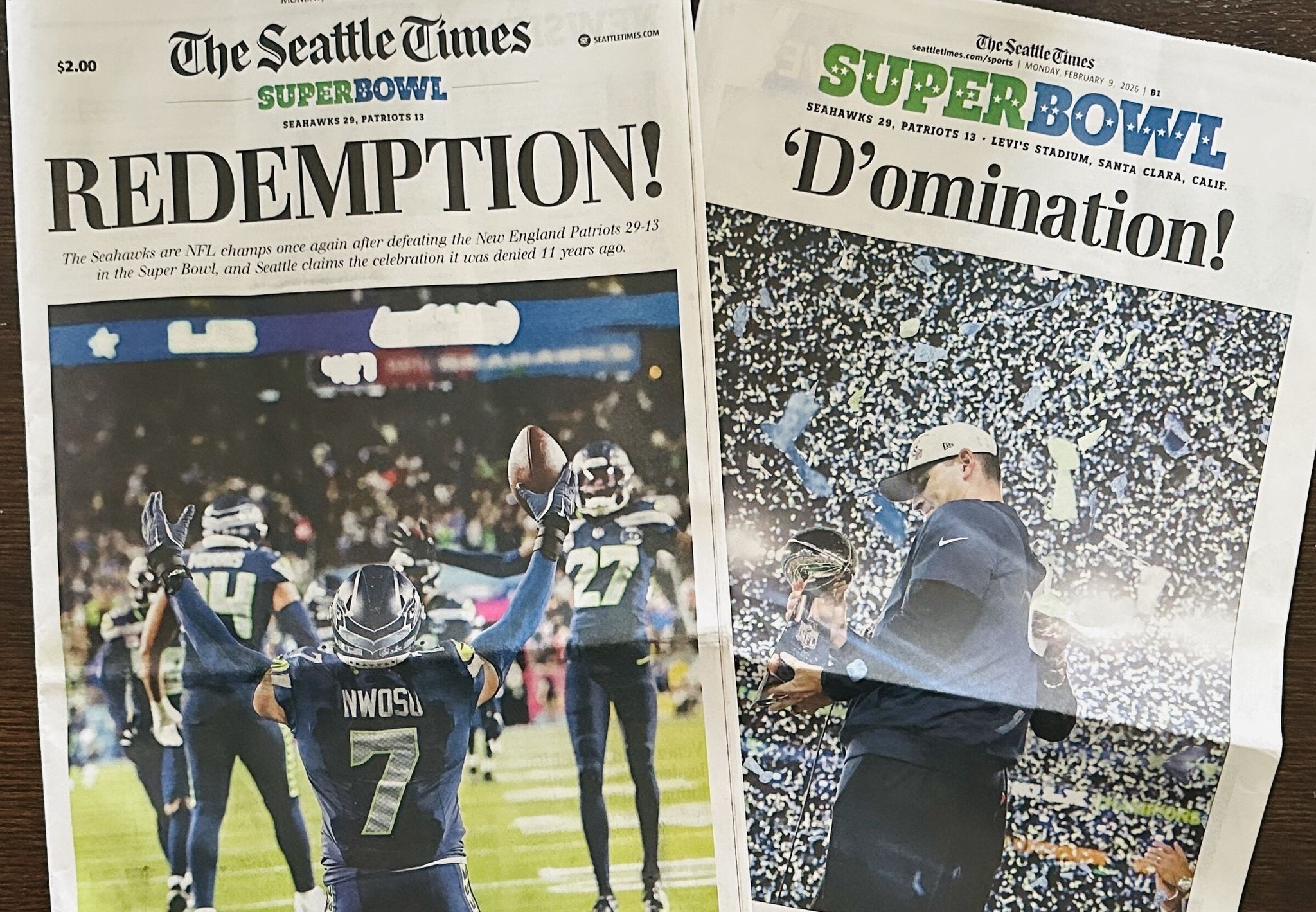 The Seahawks’ Super Bowl LX victory reflected on The Seattle Times print edition of Feb. 9, 2026. (Travis Ness / The Seattle Times)