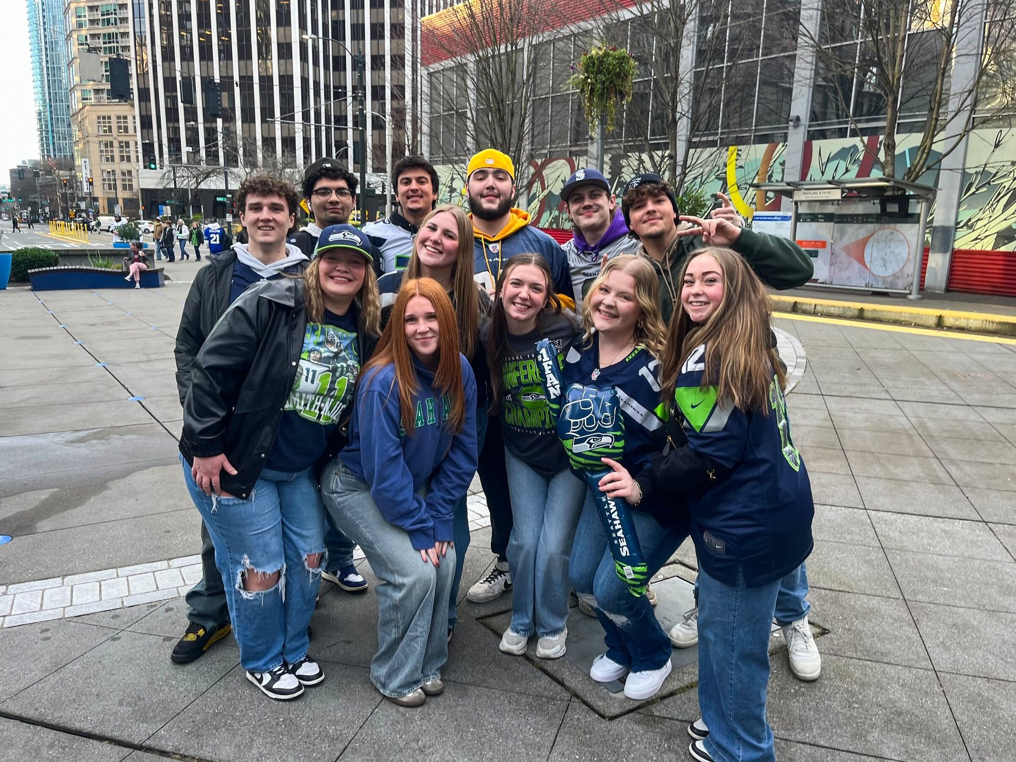 A group of about a dozen Eastern Washington University students drove from Spokane to Seattle for the Wednesday parade. (Catalina Gaitán / The Seattle Times)