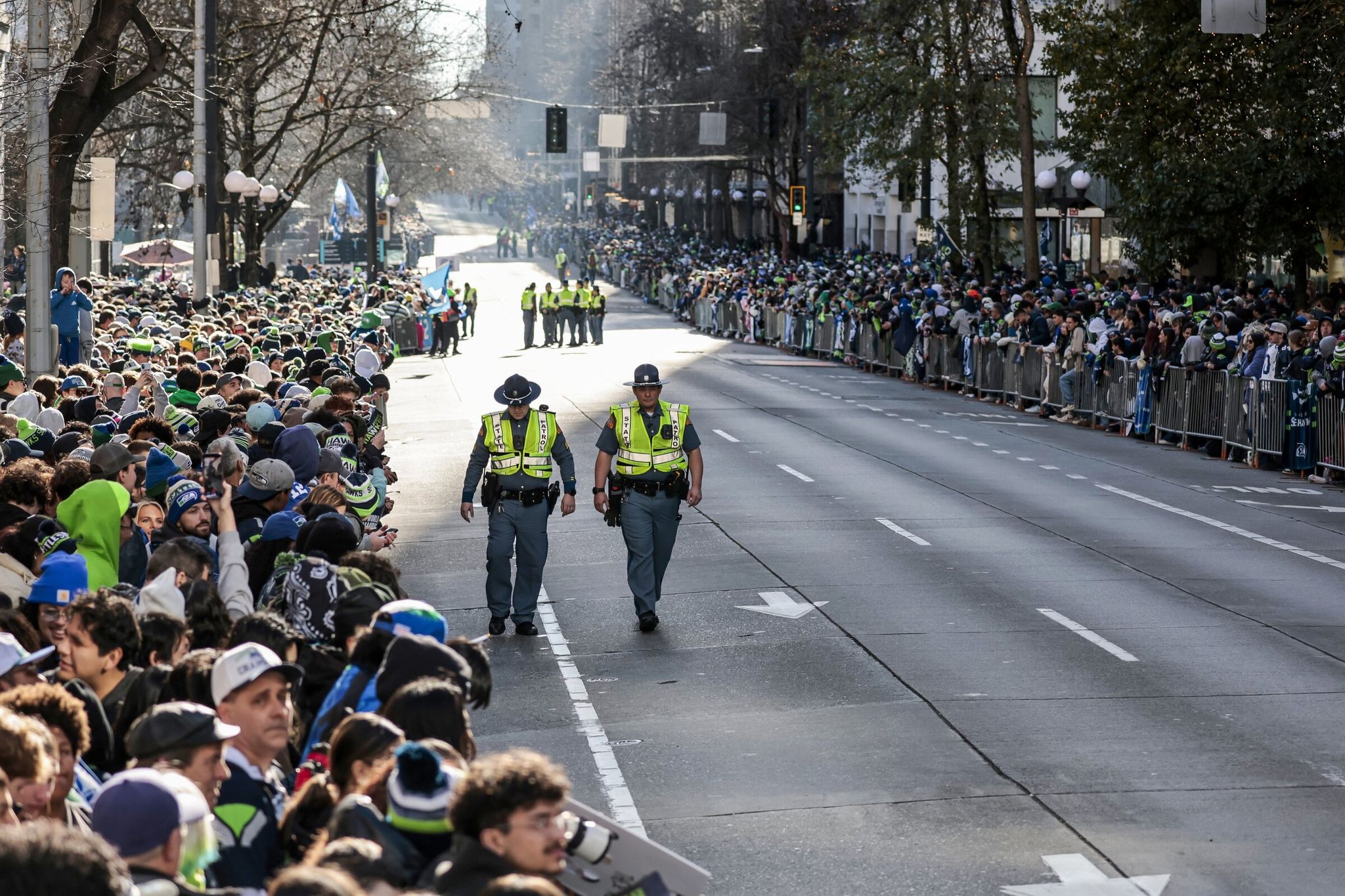 Fans lined Fourth Avenue awaiting the Seahawks Super Bowl victory parade on Wednesday. How big was the crowd? (Karen Ducey / The Seattle Times)