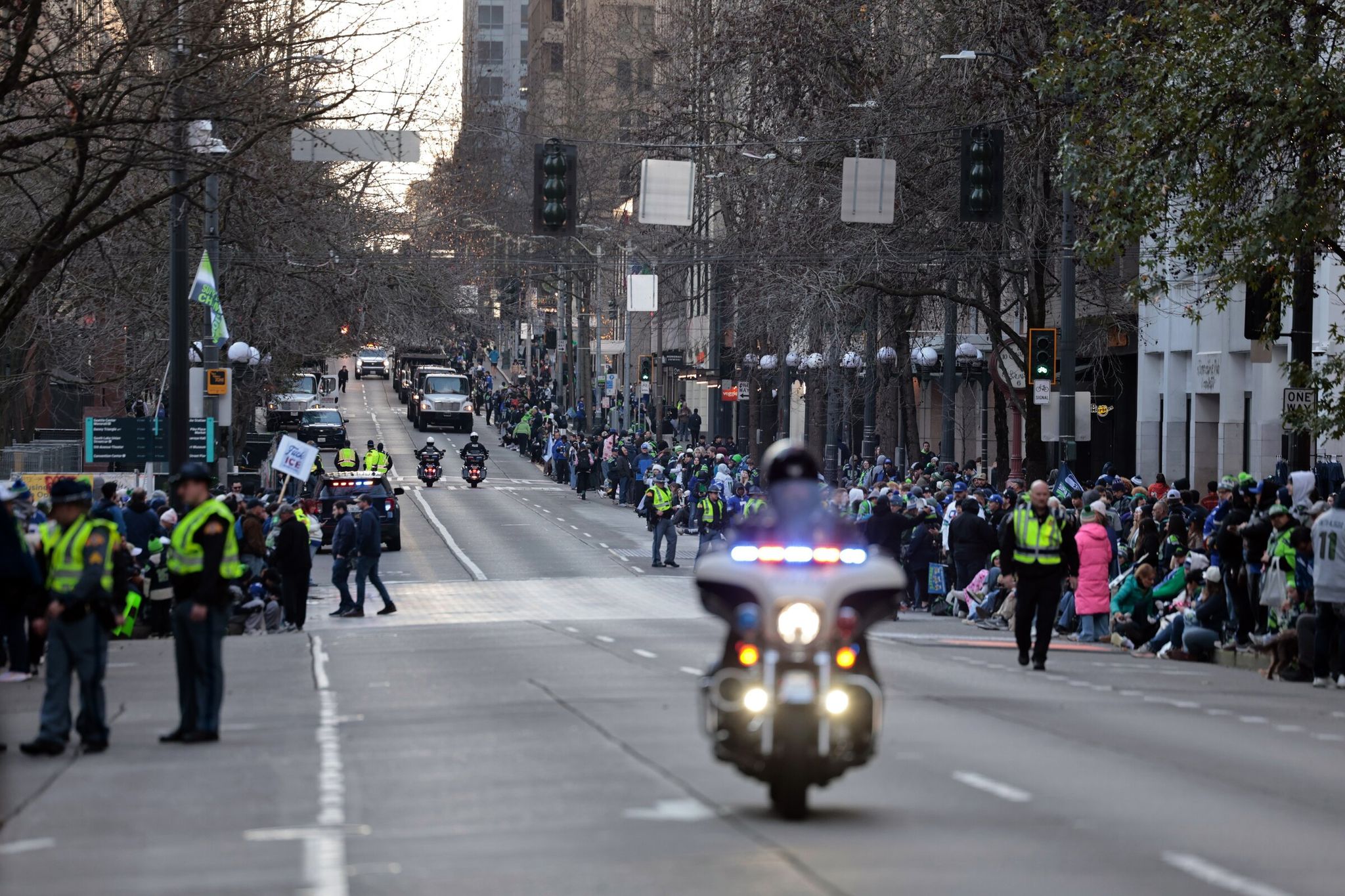 Fans line Fourth Avenue during the Seahawks world champions parade in Seattle on Wednesday. (Karen Ducey / The Seattle Times)
