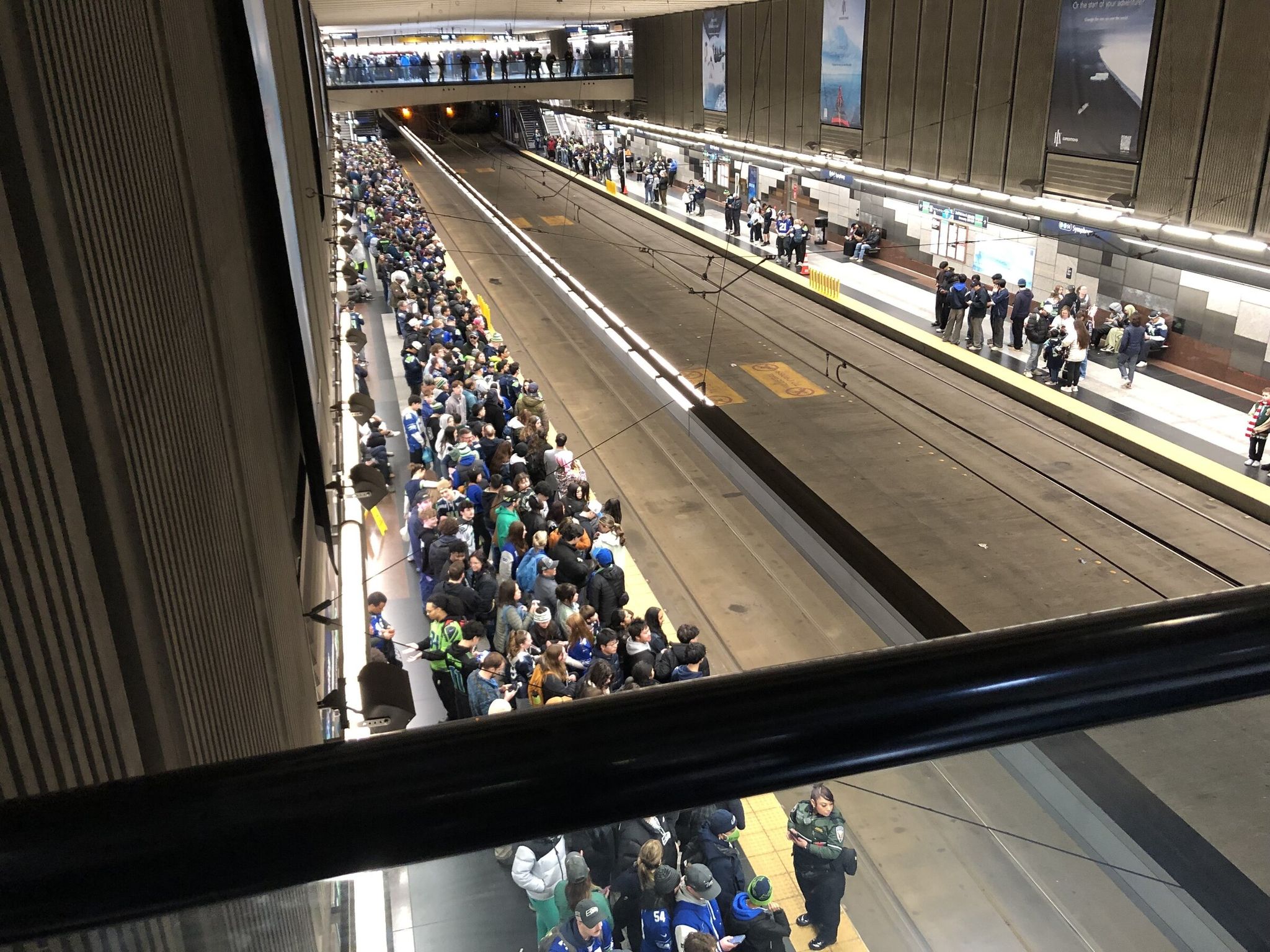 The platform at the Symphony light-rail station was packed with riders Wednesday after the Seahawks parade celebrating the Super Bowl. (Mike Lindblom / The Seattle Times)