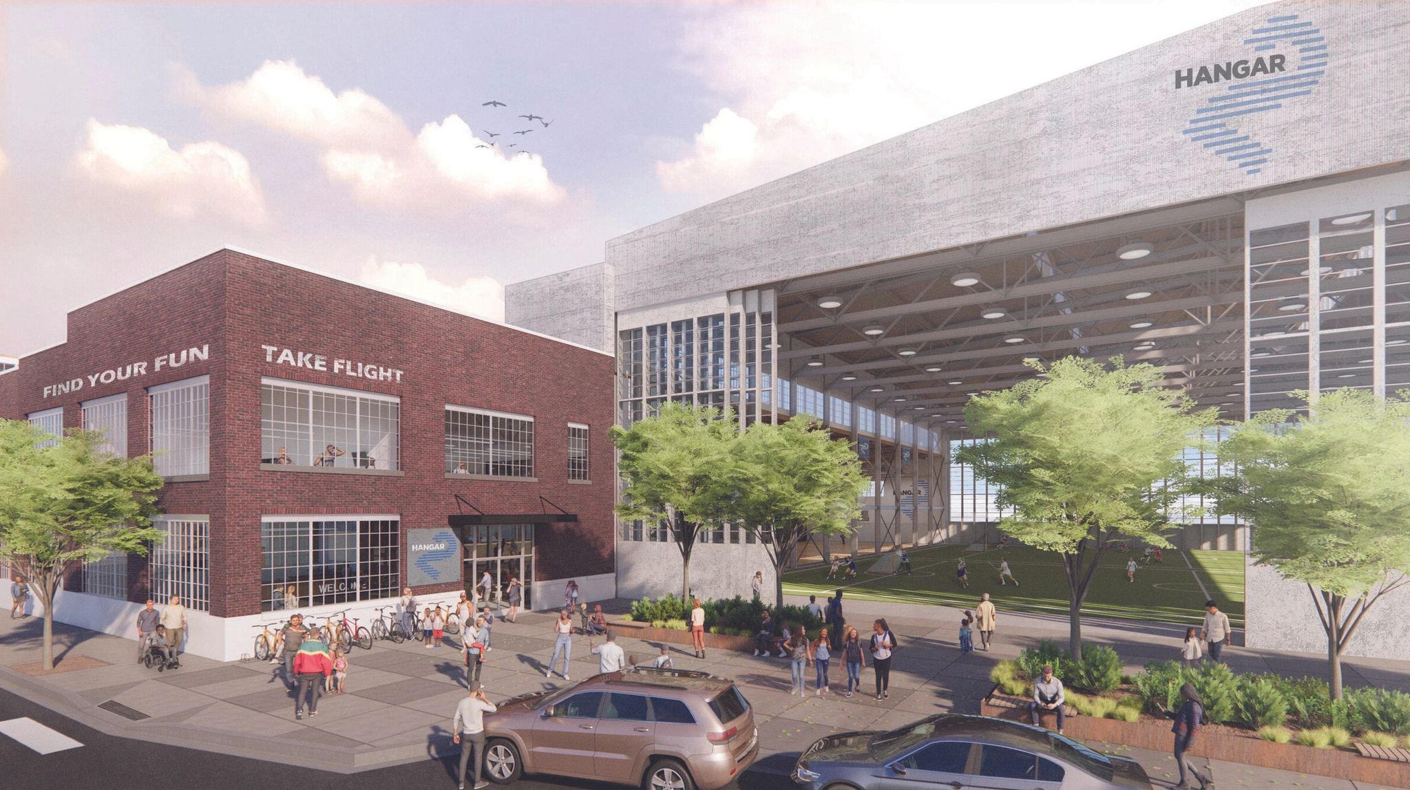 This preliminary rendering shows how Building 2 in Magnuson Park could be redeveloped for sports and other activities under the Hangar2 renovation plan. View from the west side of the structure. (Clark / Barnes via Hangar2)