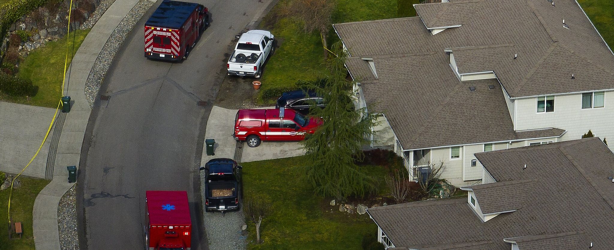 The scene in Pierce County on Tuesday where, police say, a man stabbed and killed four people before being shot by officers. The incident occurred on the Key Peninsula near Gig Harbor. (Ken Lambert / The Seattle Times)