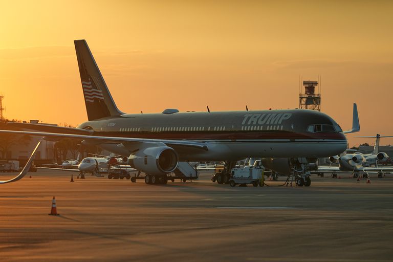  The personal plane of President Donald Trump is seen on the tarmac after Trump arrived on Air Force One, at Palm Beach. | AP Photo/Matt Rourke