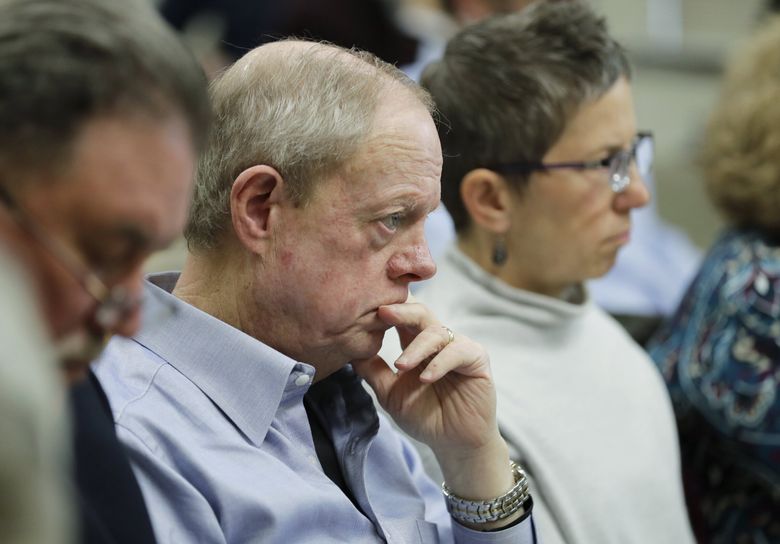 Publisher Frank Blethen sits next to Executive Editor Michele Matassa Flores at a 2019 public hearing of the Senate State Government, Tribal Relations and Elections Committee in Olympia. Blethen and other open-government advocates argued against the latest effort by Washington lawmakers to set limits on what the legislative branch needs to disclose under public disclosure laws. (Ted S. Warren / The Associated Press)