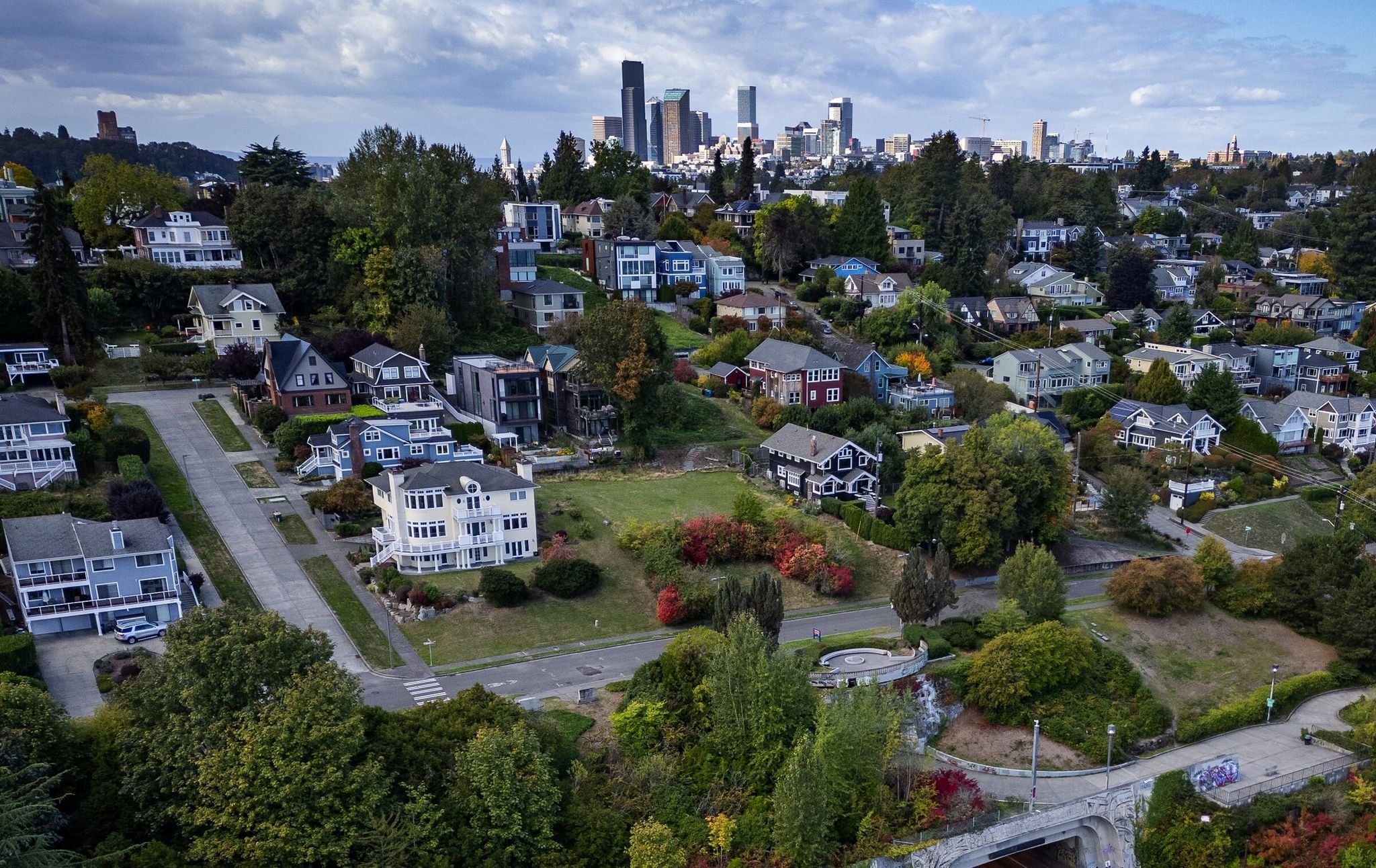 The Mount Baker neighborhood is seen from the air looking northwest, with downtown Seattle in the background. After sellers put a seasonally high number of homes on the market last month, the war in the Mideast sent mortgage rates up again. (Ken Lambert / The Seattle Times, 2024)