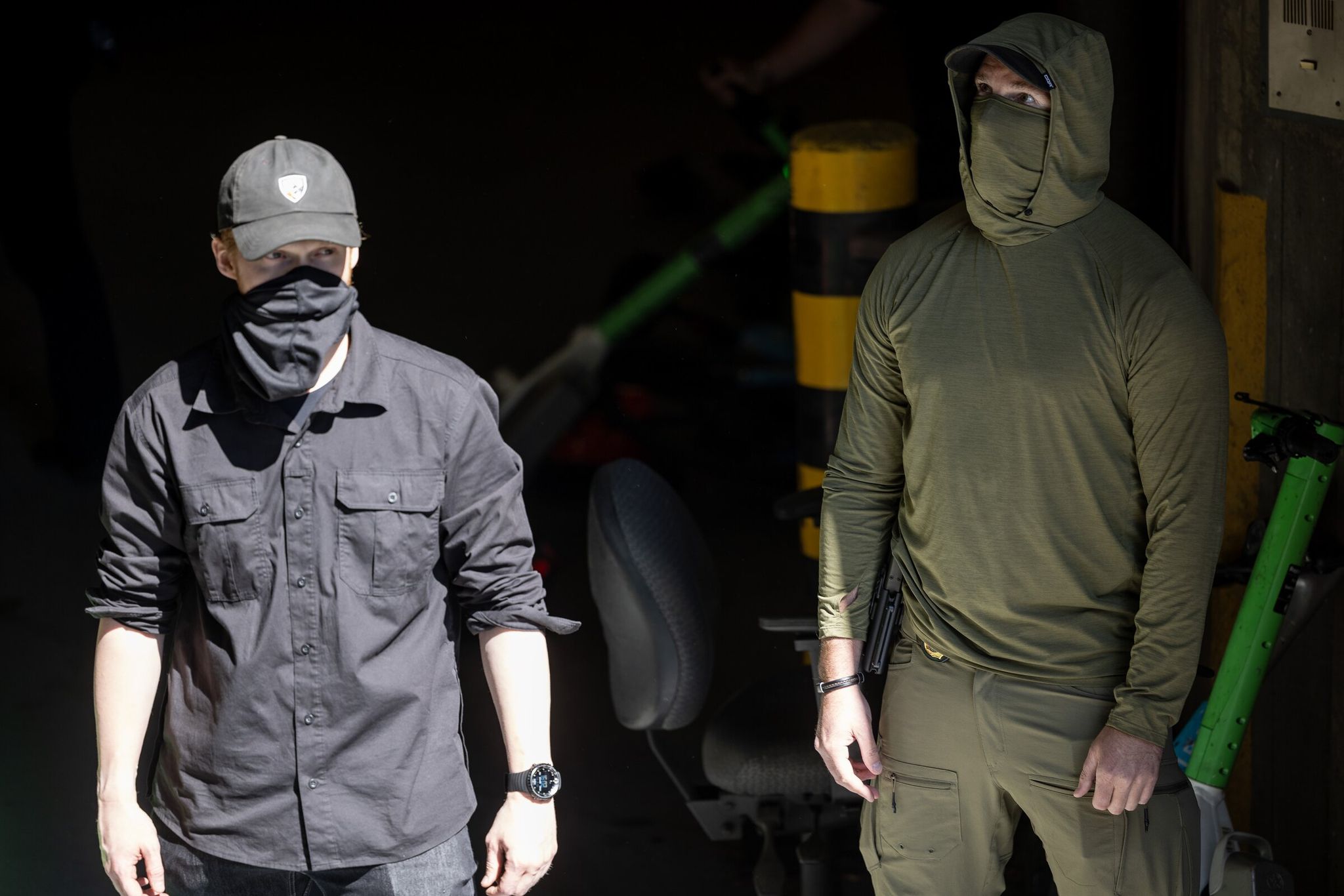 Federal officers monitor protesters from inside a sally port of the Henry M. Jackson Federal Building on June 10, 2025, in Seattle. (Nick Wagner / The Seattle Times)